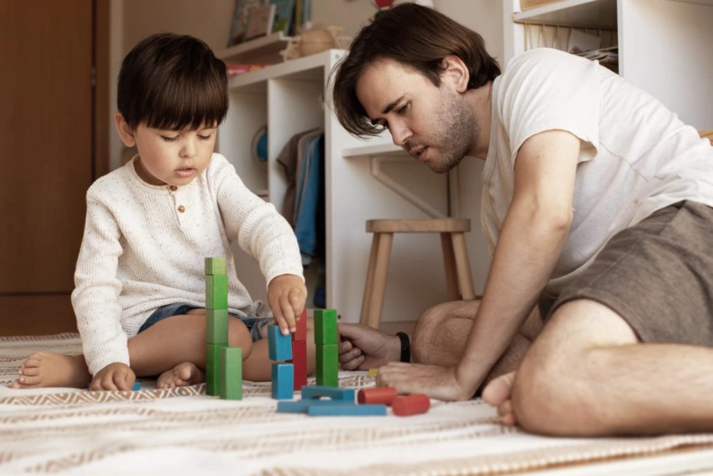 Dad playing with his son